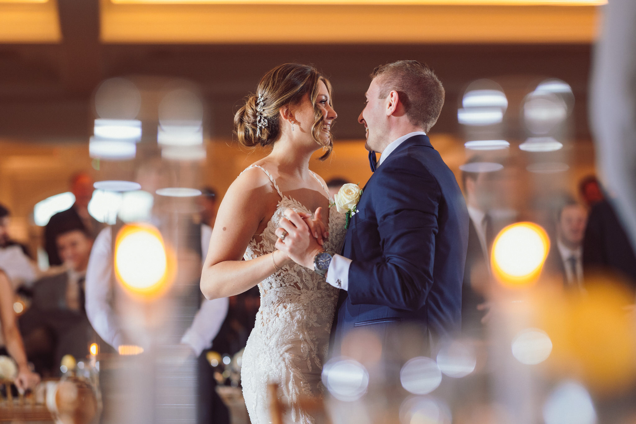 Rachel and Nick share their first dance at their Nanina's in the Park wedding Belleville NJ, surrounded by soft lighting and their guests.